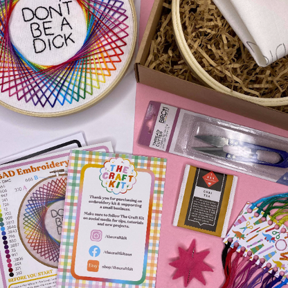contents of don't be a dick rainbow spirograph embroidery kit from the crafty cowgirl
